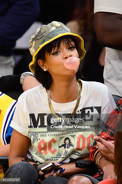 Rihanna attends a basketball game between the Golden State Warriors and the Los Angeles Lakers at Staples Center on November 22, 2013 in Los Angeles,...