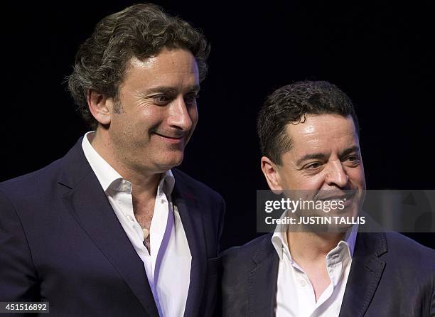 Spanish businessman Enrique Banuelos and Spanish businessman and CEO of Formula E holdings Alejandro Agag pose for a photograph on stage at the...