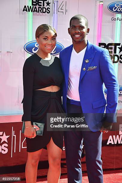 Jada Crawley and Chris Paul attend the BET AWARDS '14 at Nokia Theatre L.A. LIVE on June 29, 2014 in Los Angeles, California.
