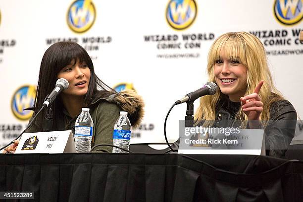 Actresses Kelly Hu and Spencer Locke attend day one of the Wizard World Austin Comic Con at the Austin Convention Center on November 22, 2013 in...