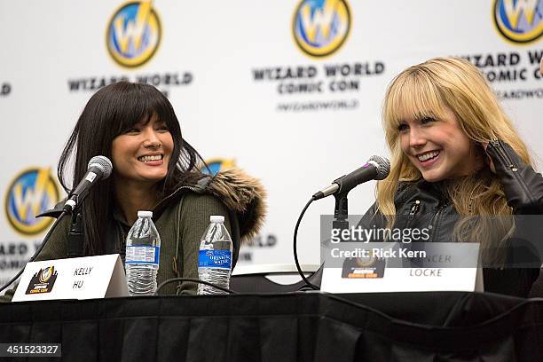 Actresses Kelly Hu and Spencer Locke attend day one of the Wizard World Austin Comic Con at the Austin Convention Center on November 22, 2013 in...