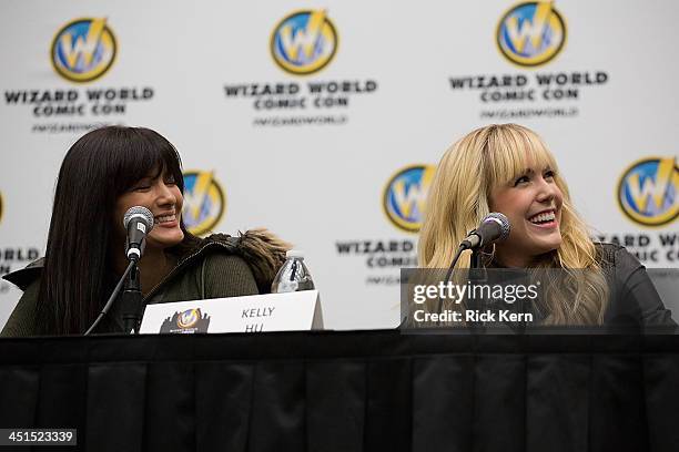 Actresses Kelly Hu and Spencer Locke attend day one of the Wizard World Austin Comic Con at the Austin Convention Center on November 22, 2013 in...