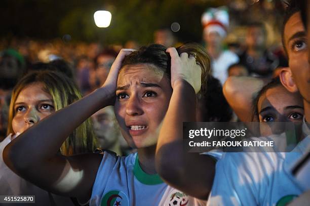 Fans of Alergia react during a public screening June 30, 2014 in Algiers of Algeria's 2014 FIFA World Cup match against Germany in Brazil. Extra-time...