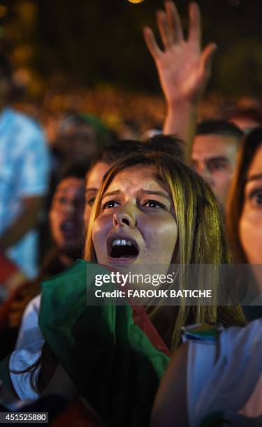 Fans of Alergia react during a public screening June 30, 2014 in Algiers of Algeria's 2014 FIFA World Cup match against Germany in Brazil. Extra-time...