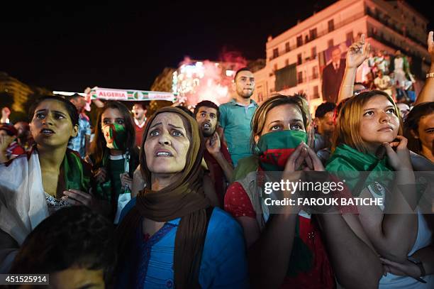 Fans of Alergia react during a public screening June 30, 2014 in Algiers of Algeria's 2014 FIFA World Cup match against Germany in Brazil. Extra-time...