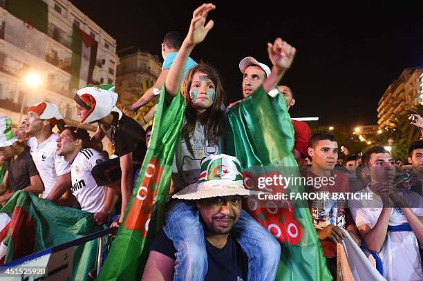 Fans of Alergia react during a public screening June 30, 2014 in Algiers of Algeria's 2014 FIFA World Cup match against Germany in Brazil. Extra-time...