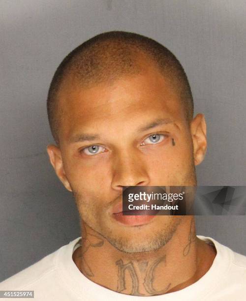 In this handout photo provided by the Stockton Police Department, Jeremy Meeks is seen in a police booking photo after his arrest on felony weapon...