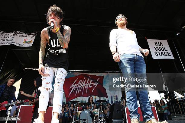 Vocalists David Schmitt of Breathe Carolina and Danny Worsnop of Asking Alexandria perform during the Vans Warped Tour on June 22, 2014 in Ventura,...