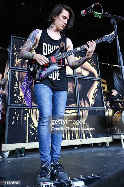 Guitarist Jacky Vincent of Falling In Reverse performs during the Vans Warped Tour on June 22, 2014 in Ventura, California.