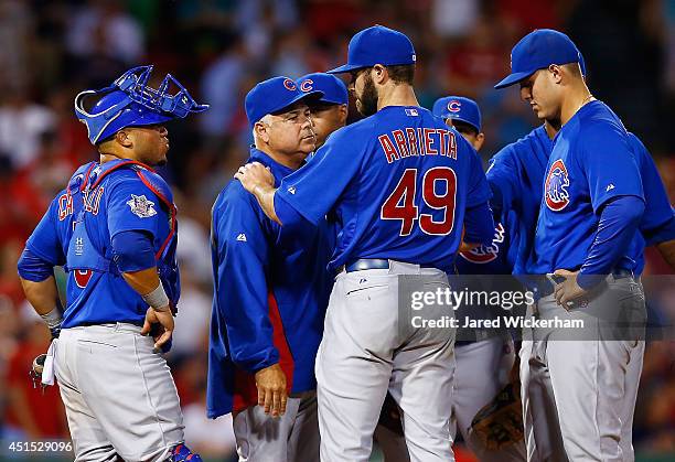 Jake Arrieta of the Chicago Cubs is pulled by manager Rick Renteria after giving up his one and only hit in the eighth inning to Stephen Drew of the...