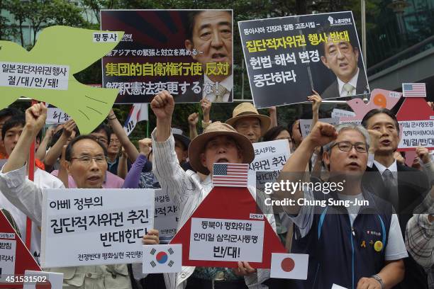 South Korean activists hold a rally at the Japanese Embassy against Japan's collective self-defense plan on July 1, 2014 in Seoul, South Korea....