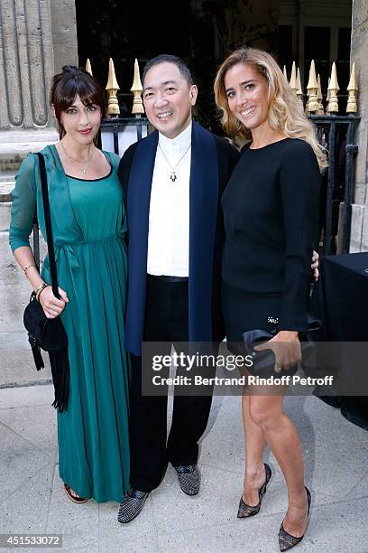 Singer Nolwenn Leroy, Qeelin jeweler Dennis Chan and Vahina Giocante attend the 'Qeelin' high Jewellery Exhibition opening Cocktail 'Mogoaku in...