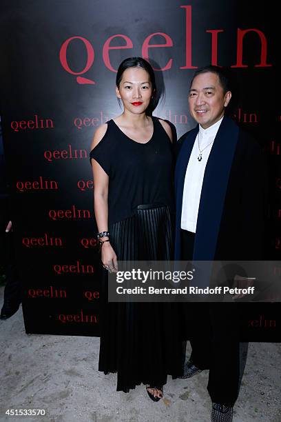 Tina Leung and Qeelin jeweler Dennis Chan attend the 'Qeelin' high Jewellery Exhibition opening Cocktail 'Mogoaku in Paris' at Jardin du Palais Royal...