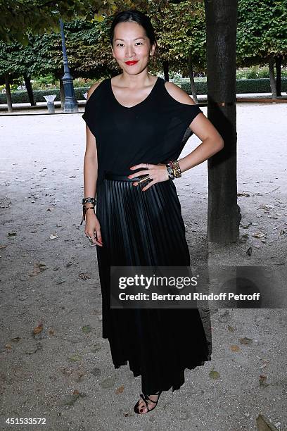 Tina Leung attends the 'Qeelin' high Jewellery Exhibition opening Cocktail 'Mogoaku in Paris' at Jardin du Palais Royal on June 30, 2014 in Paris,...