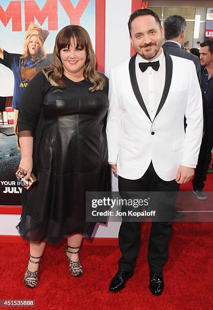 Actress Melissa McCarthy and husband director Ben Falcone arrive at the Los Angeles Premiere "Tammy" at TCL Chinese Theatre on June 30, 2014 in...