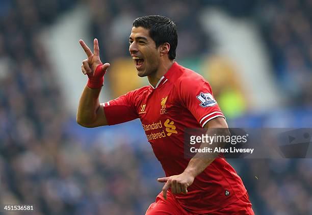 Luis Suarez of Liverpool celebrates scoring his team's second goal during the Barclays Premier League match between Everton and Liverpool at Goodison...