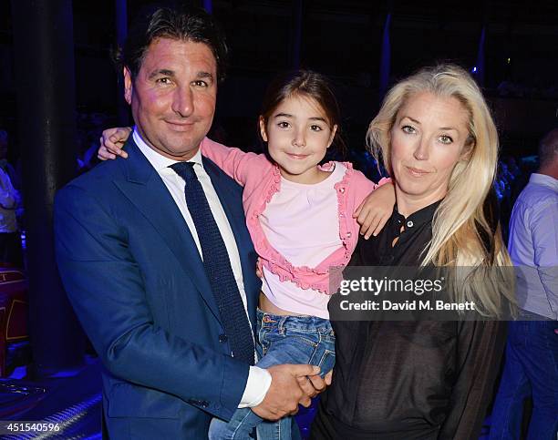 Giorgio Veroni and Tamara Beckwith pose with daughter Violet at the global launch of the FIA Formula E Championship, celebrating the founding of the...