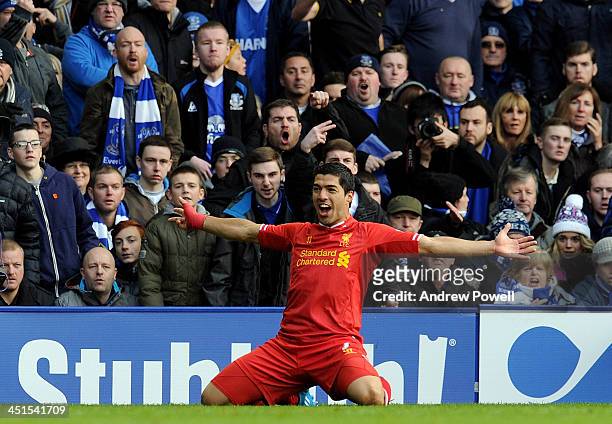 Luis Suarez of Liverpool celebrates after scoring the second goal during the Barclays Premier League match between Everton and Liverpool at Goodison...