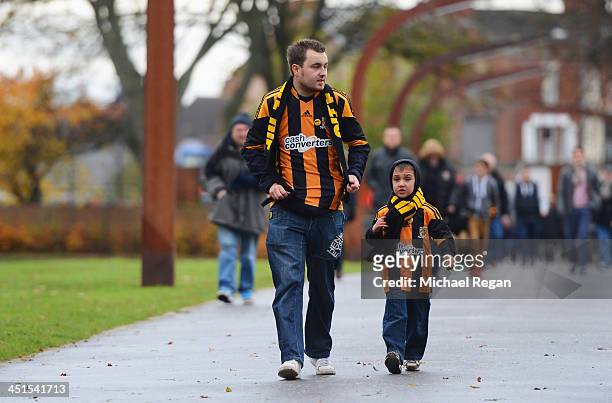 Hull City fans walk towards the ground prior to the Barclays Premier League match between Hull City and Crystal Palace at KC Stadium on November 23,...