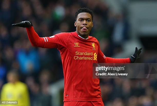 Daniel Sturridge of Liverpool celebrates scoring his team's third goal during the Barclays Premier League match between Everton and Liverpool at...