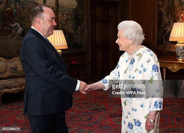 Queen Elizabeth II holds an audience with Scotland's First Minister Alex Salmond at the Palace of Holyroodhouse on July 1, 2014 in Edinburgh,...