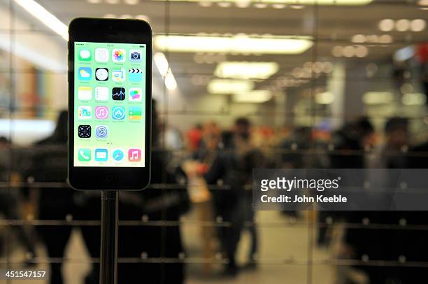 General view of an iphone in the window of the Apple store on regent Street on November 20, 2013 in London, England. Apple CEO Tim Cook recently...