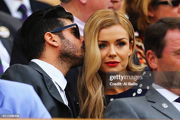 Andrew Levitas and Katherine Jenkins look on from the Royal Box on day eight of the Wimbledon Lawn Tennis Championships at the All England Lawn...