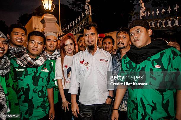 Musician Ahmad Dhani , poses with supporters during Presidential candidate Prabowo Subianto meets with Sultan of Yogyakarta Hamengkubuwono X on at...