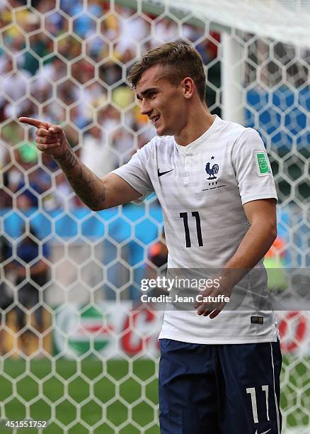 Antoine Griezmann of France celebrates France's second goal during the 2014 FIFA World Cup Brazil Round of 16 match between France and Nigeria at...