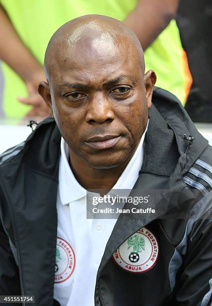 Head coach of Nigeria Stephen Keshi looks on during the 2014 FIFA World Cup Brazil Round of 16 match between France and Nigeria at Estadio Nacional...