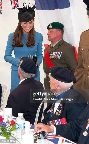 Catherine, Duchess of Cambridge meets veterans for tea before attending the Commemoration of the 70th anniversary of the Normandy Landings at Gold...