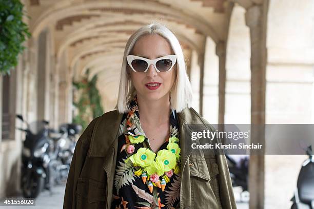 Fashion writer for Dapper Dan Magazine Elena Psalti wearing a Joanna Pybus bag, Miu Miu sunglasses, Marc by Marc Jacobs jacket and a vintage shirt on...