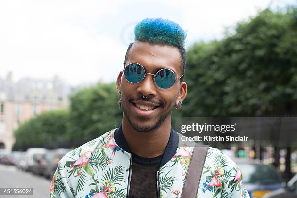 Hair styilist Jason Lee Preston wearing a Zara jacket and vintage sunglasses on day 1 of Paris Collections: Men on June 25, 2014 in Paris, France.