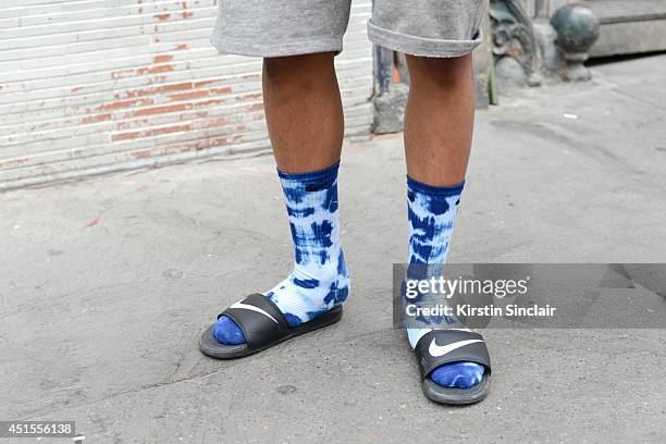 Guest wearing tie dye socks and Nike sandals on day 1 of Paris Collections: Men on June 25, 2014 in Paris, France.