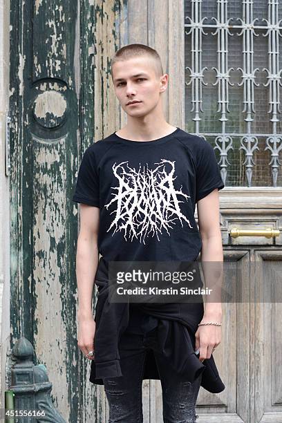 Model Anton Lisin wearing H and M jeans, Anton Lisin T-shirt on day 1 of Paris Collections: Men on June 25, 2014 in Paris, France.