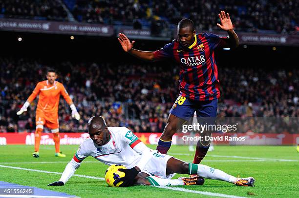 Adama of FC Barcelona duels for the ball with Foulquier of Granada CF during the La Liga match between FC Barcelona and Granda CF at Camp Nou on...