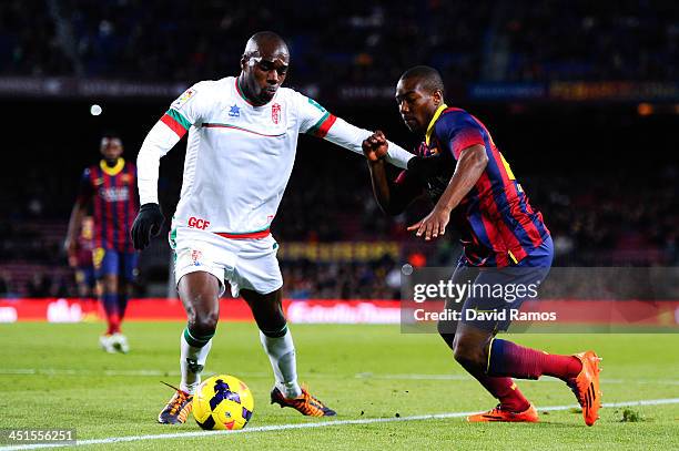 Adama of FC Barcelona duels for the ball with Foulquier of Granada CF during the La Liga match between FC Barcelona and Granda CF at Camp Nou on...