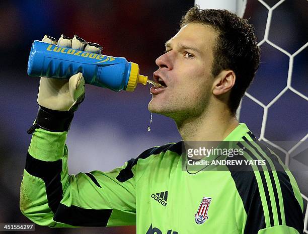 Stoke City's Bosnian goalkeeper Asmir Begovic takes a drink during the English Premier League football match between Stoke City and Sunderland at the...