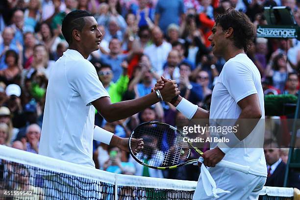 Nick Kyrgios of Australia shakes hands with Rafael Nadal of Spain after their Gentlemen's Singles fourth round match on day eight of the Wimbledon...