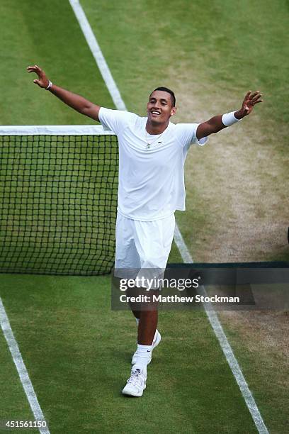 Nick Kyrgios of Australia celebrates match point and winning his Gentlemen's Singles fourth round match against Rafael Nadal of Spain on day eight of...