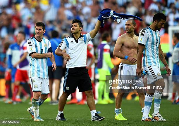 Lionel Messi, Sergio Aguero, Pablo Zabaleta and Ezequiel Garay of Argentina celebrate the 1-0 win after the 2014 FIFA World Cup Brazil Round of 16...