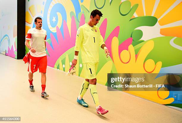 Diego Benaglio of Switzerland shows his dejection in the tunnel after the 0-1 defeat in the 2014 FIFA World Cup Brazil Round of 16 match between...