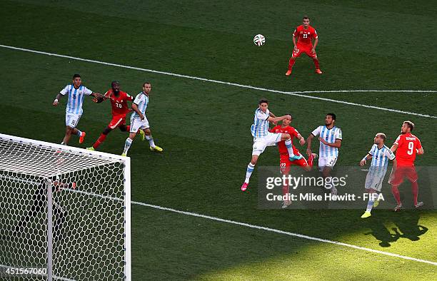 Players compete during the 2014 FIFA World Cup Brazil Round of 16 match between Argentina and Switzerland at Arena de Sao Paulo on July 1, 2014 in...