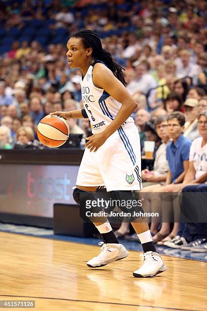 Tan White of the Minnesota Lynx handles the ball against the Seattle Storm on June 29, 2014 at Target Center in Minneapolis, Minnesota. NOTE TO USER:...