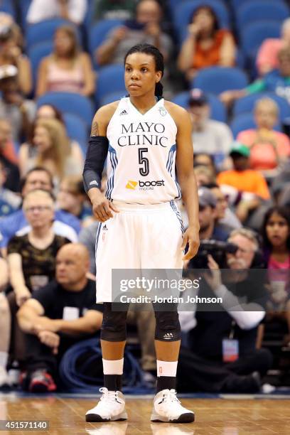 Tan White of the Minnesota Lynx stands on the court during a game against the Seattle Storm on June 29, 2014 at Target Center in Minneapolis,...