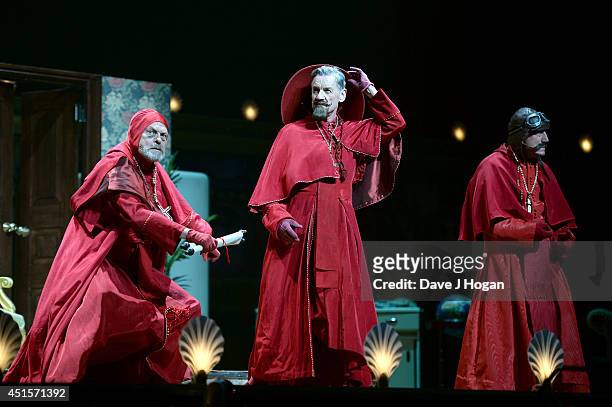 Terry Gilliam, Michael Palin and Terry Jones perform on the opening night of "Monty Python Live " on July 1, 2014 in London, England.