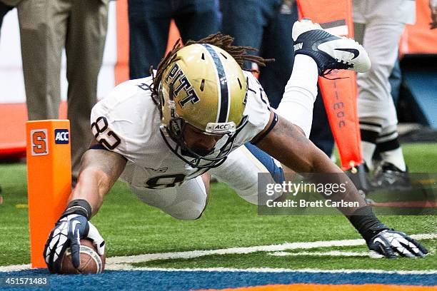 Manasseh Garner of the Pittsburgh Panthers dives into the end zone for a touchdown in the first half of a football game against Syracuse Orange on...