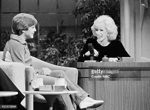 Pictured: Olympic gymnast Mary Lou Retton during an interview with guest host Joan Rivers on August 8, 1984 --
