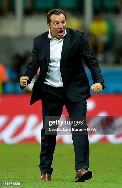 Head coach Marc Wilmots of Belgium celebrates his team's first goal during the 2014 FIFA World Cup Brazil Round of 16 match between Belgium and USA...