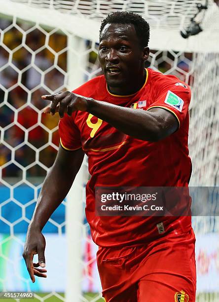 Romelu Lukaku of Belgium celebrates scoring his team's second goal in extra time during the 2014 FIFA World Cup Brazil Round of 16 match between...